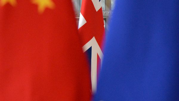 European Union and Chinese flags are pictured during an annual EU-China summit in Brussels, Belgium. - Sputnik International
