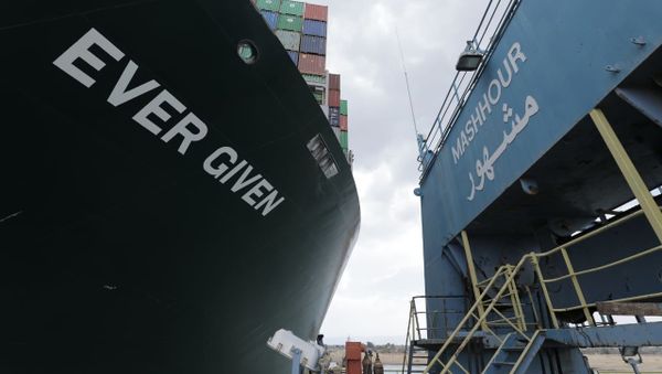 Stranded container ship Ever Given, one of the world's largest container ships, is seen after it ran aground, in Suez Canal, Egypt March 26, 2021 - Sputnik International