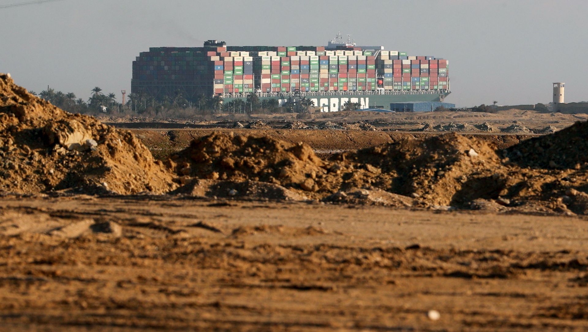 Stranded container ship Ever Given, one of the world's largest container ships, is seen after it ran aground, in Suez Canal, Egypt March 26, 2021 Stranded container ship Ever Given, one of the world's largest container ships, is seen after it ran aground, in Suez Canal, Egypt March 26, 2021 - Sputnik International, 1920, 26.03.2021