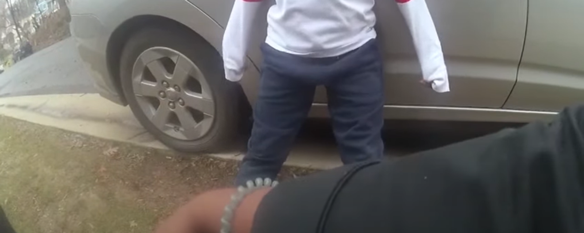 Screenshot from the body-camera footage released by Montgomery County Police Department, showing two police officers berating a 5-year-old boy - Sputnik International, 1920, 28.03.2021