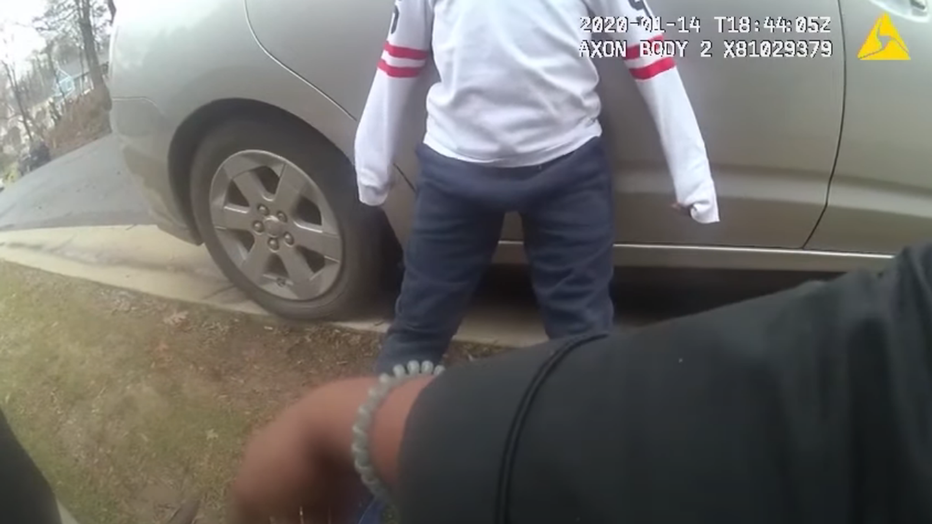 Screenshot from the body-camera footage released by Montgomery County Police Department, showing two police officers berating a 5-year-old boy Screenshot from the body-camera footage released by Montgomery County Police Department, showing two police officers berating a 5-year-old boy - Sputnik International, 1920, 28.03.2021