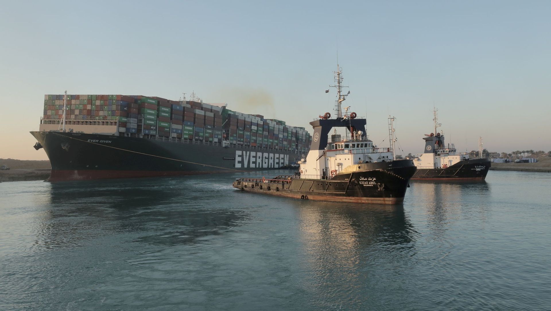 A view shows the container ship Ever Given, one of the world's largest container ships, after it was partially refloated, in Suez Canal, Egypt March 29, 2021 A view shows the container ship Ever Given, one of the world's largest container ships, after it was partially refloated, in Suez Canal, Egypt March 29, 2021 - Sputnik International, 1920, 29.03.2021