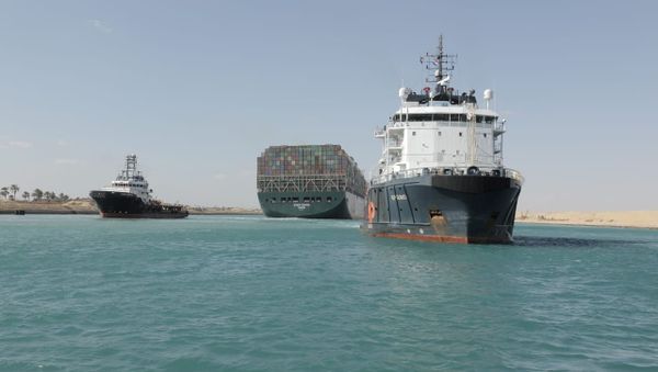Ship Ever Given, one of the world's largest container ships, is seen after it was fully floated in Suez Canal, Egypt March 29, 2021. - Sputnik International