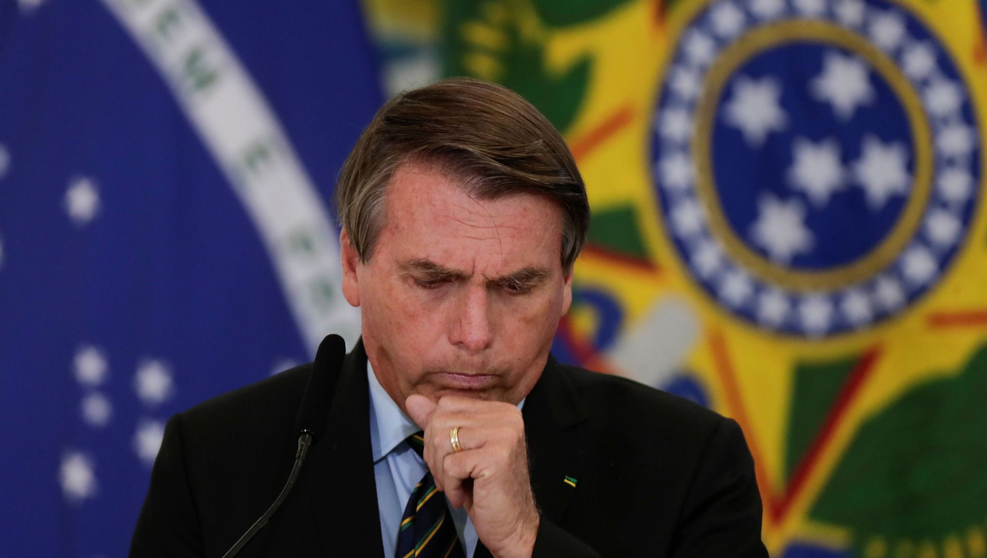 Brazil's President Jair Bolsonaro coughs during a ceremony to announce measures by Caixa Economica bank in support of philanthropic hospitals, in Brasilia, Brazil March 25, 2021. Brazil's President Jair Bolsonaro coughs during a ceremony to announce measures by Caixa Economica bank in support of philanthropic hospitals, in Brasilia, Brazil March 25, 2021. - Sputnik International, 1920, 30.03.2021