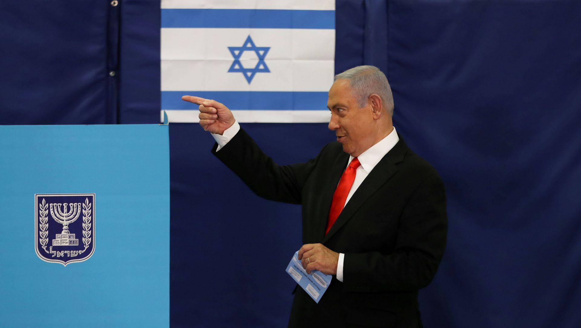 FILE PHOTO: Israeli Prime Minister Benjamin Netanyahu gestures while standing near a voting booth as he prepares to cast his ballot in Israel's general election, at a polling station in Jerusalem, 23 March 2021. FILE PHOTO: Israeli Prime Minister Benjamin Netanyahu gestures while standing near a voting booth as he prepares to cast his ballot in Israel's general election, at a polling station in Jerusalem, 23 March 2021. - Sputnik International, 1920, 30.03.2021