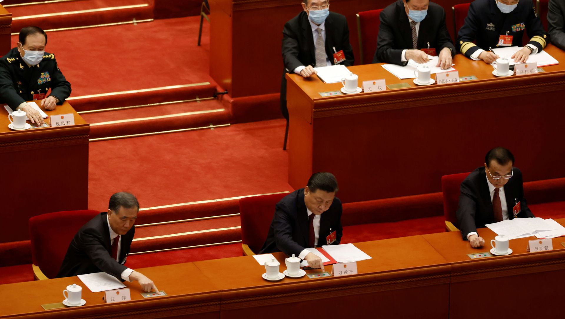 Chinese President Xi Jinping and other leaders cast their votes on Hong Kong electoral reform at the closing session of the National People's Congress (NPC) at the Great Hall of the People in Beijing, China March 11, 2021 Chinese President Xi Jinping and other leaders cast their votes on Hong Kong electoral reform at the closing session of the National People's Congress (NPC) at the Great Hall of the People in Beijing, China March 11, 2021 - Sputnik International, 1920, 30.03.2021