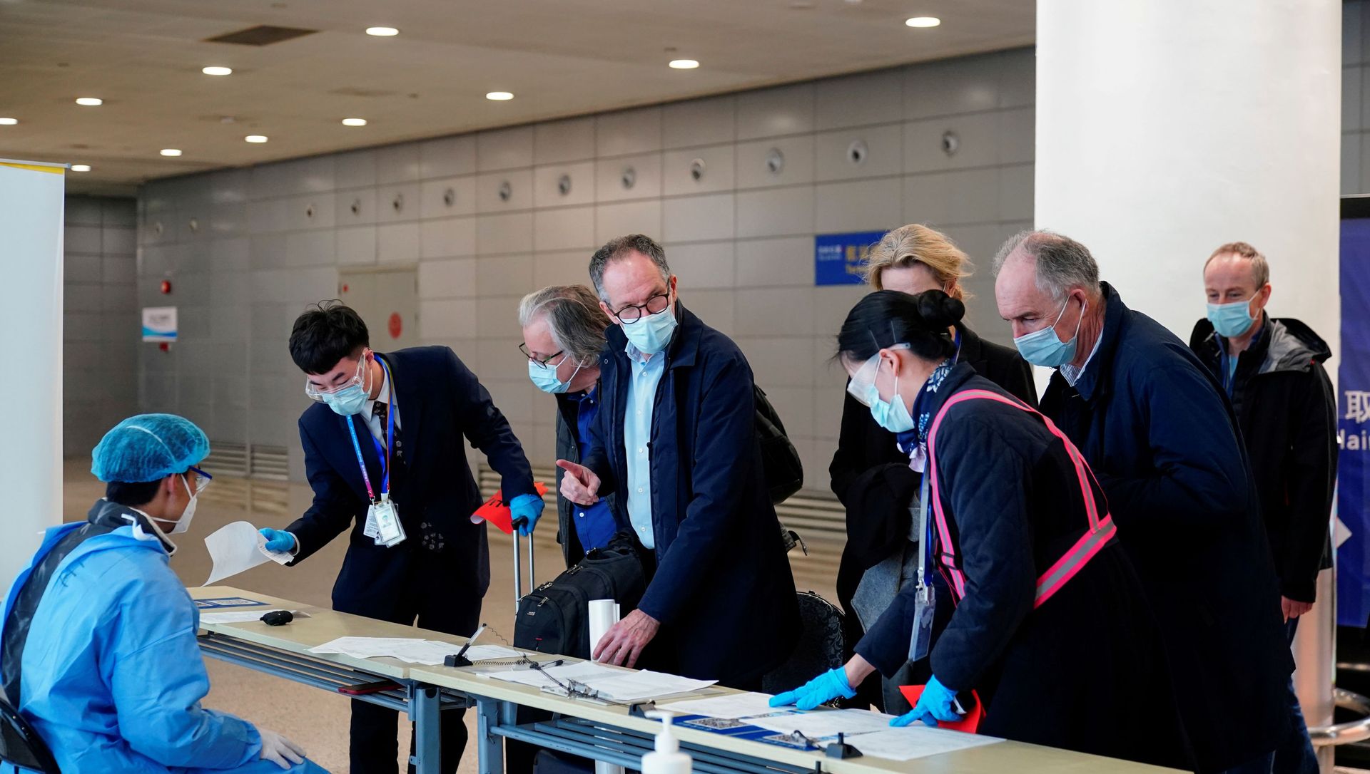 Peter Ben Embarek, and other members of the World Health Organisation (WHO) team tasked with investigating the origins of the coronavirus disease (COVID-19), arrive at the Pudong International Airport in Shanghai, China February 10, 2021. Peter Ben Embarek, and other members of the World Health Organisation (WHO) team tasked with investigating the origins of the coronavirus disease (COVID-19), arrive at the Pudong International Airport in Shanghai, China February 10, 2021. - Sputnik International, 1920, 31.03.2021