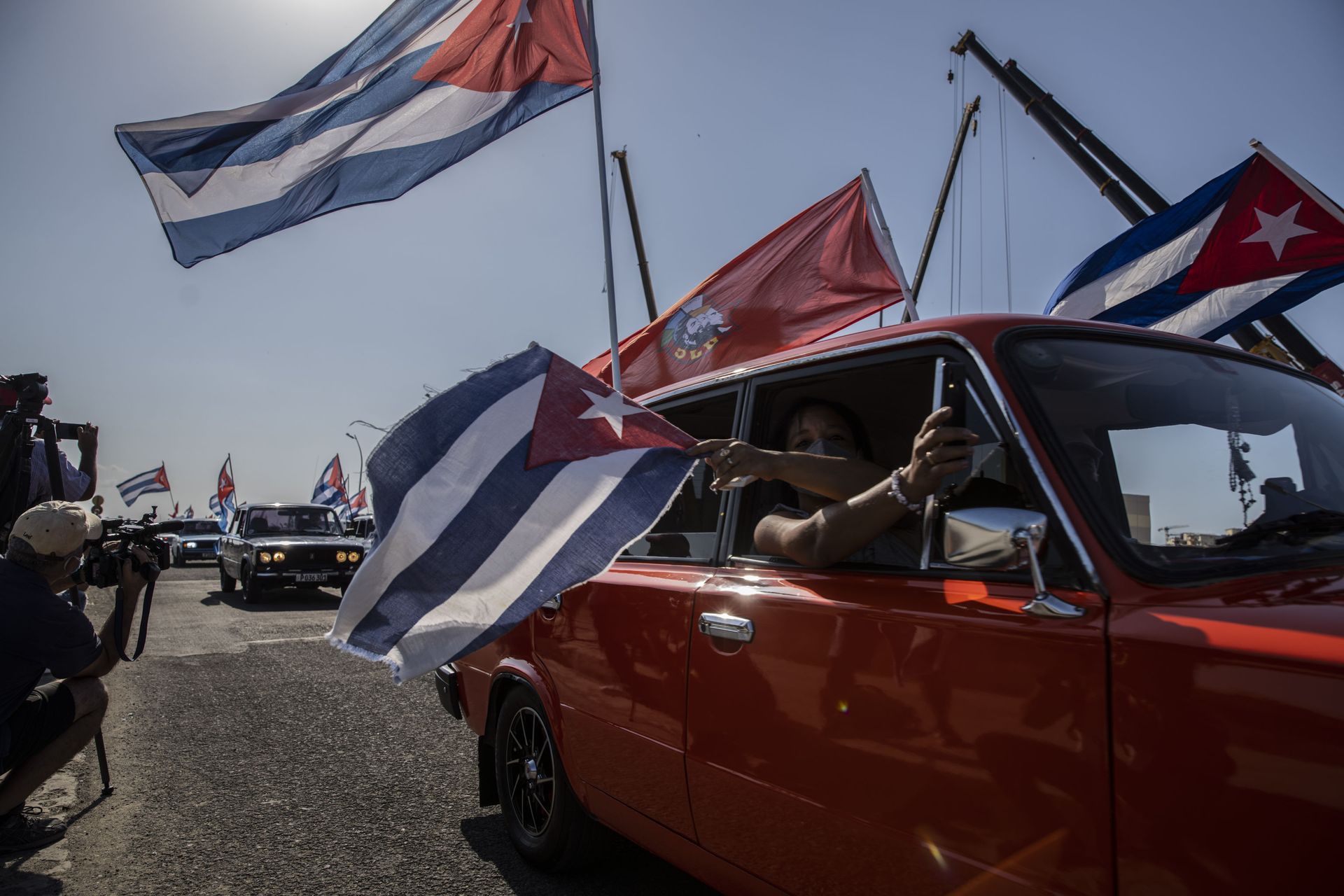 Soviet-era Lada cars flying Cuban flag drive past the American embassy during a rally calling for the end of the US blockade against the island nation in Havana, Cuba, Sunday, March 28, 2021 Soviet-era Lada cars flying Cuban flag drive past the American embassy during a rally calling for the end of the US blockade against the island nation in Havana, Cuba, Sunday, March 28, 2021 - Sputnik International, 1920, 07.09.2021