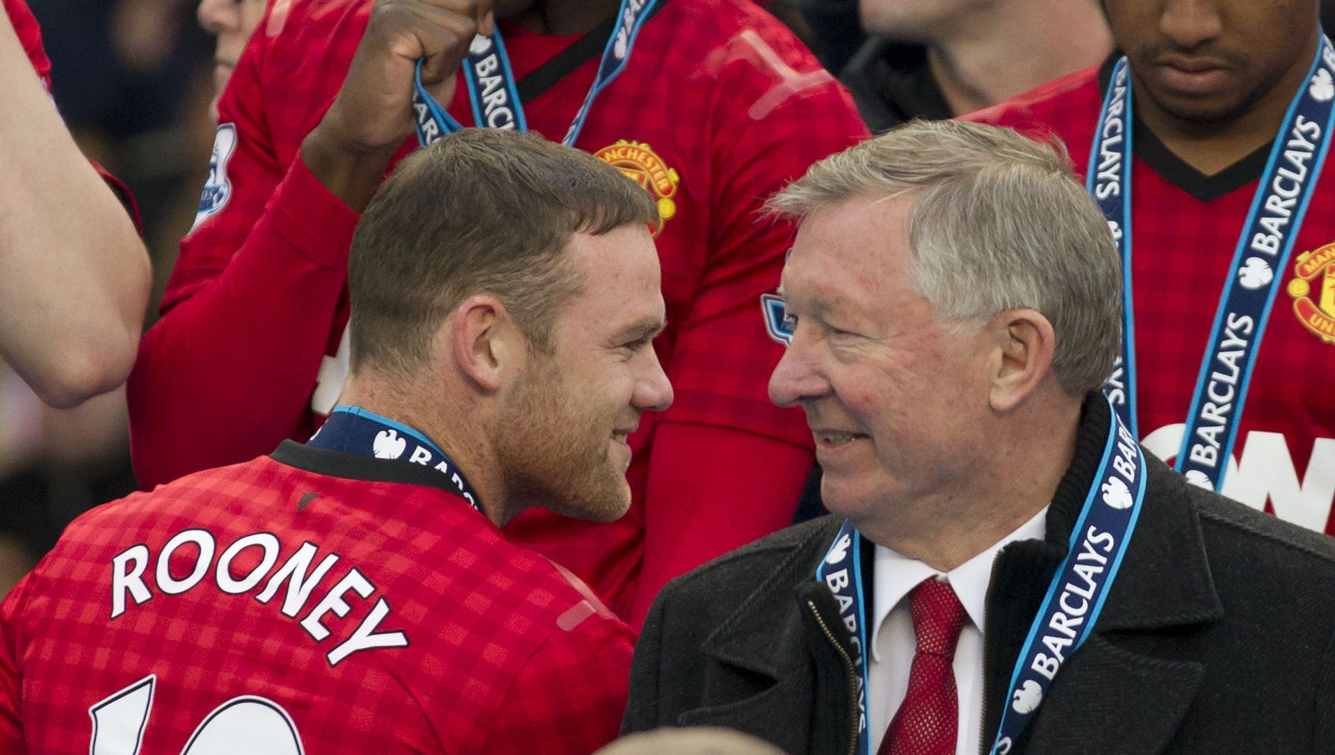 Manchester United's manager Sir Alex Ferguson, right, speaks to striker Wayne Rooney after his last home game in charge of the club, their English Premier League soccer match against Swansea, at Old Trafford Stadium, Manchester, England, Sunday May 12, 2013 Manchester United's manager Sir Alex Ferguson, right, speaks to striker Wayne Rooney after his last home game in charge of the club, their English Premier League soccer match against Swansea, at Old Trafford Stadium, Manchester, England, Sunday May 12, 2013 - Sputnik International, 1920, 01.04.2021