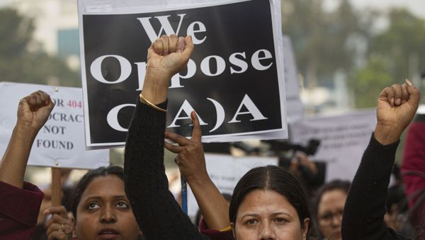 Indian women participate in a protest procession against the Citizenship Amendment Act in Gauhati, India, Sunday, Jan. 19, 2020 Indian women participate in a protest procession against the Citizenship Amendment Act in Gauhati, India, Sunday, Jan. 19, 2020 - Sputnik International