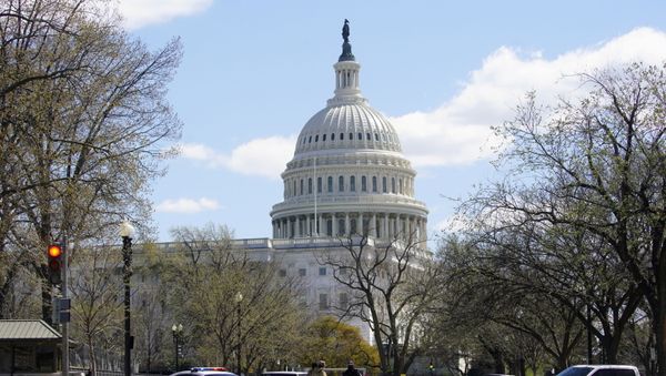 Law enforcement officers guard streets surrounding the U.S. Capitol and congressional office buildings following a security threat at the U.S. Capitol in Washington, U.S., April 2, 2021. - Sputnik International