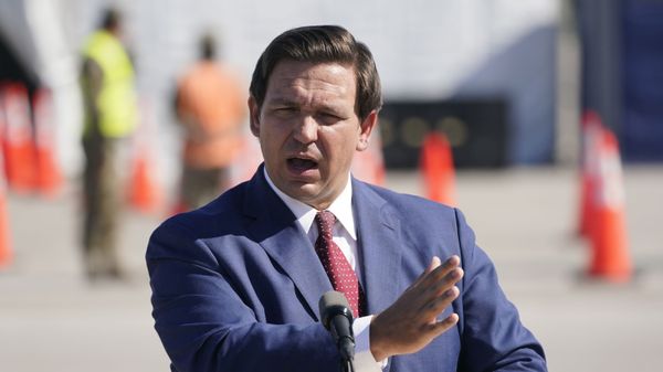 Florida Gov. Ron DeSantis speaks at a COVID-19 testing site, Wednesday, Jan. 6, 2021, outside Hard Rock Stadium in Miami Gardens, Fla. First responders and people over 65 years-old began receiving the COVID-19 vaccine Wednesday during a trial run of the site which will open to seniors at a later date. (AP Photo/Wilfredo Lee) - Sputnik International
