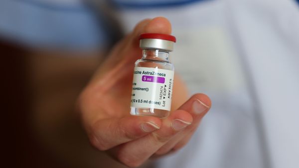 A member of the medical staff shows the vial containing the AstraZeneca Covid-19 vaccine dose for Prime Minister Jean Castex, at the Hopital díInstruction des Armees Begin, in Saint-Mande, on the outskirts of Paris, Friday, March 19, 2021 - Sputnik International