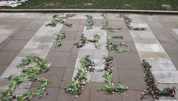 Flowers that spell out the word Kill the Bill are seen on the floor on Parliament Square in London, Britain, March 17, 2021.  - Sputnik International