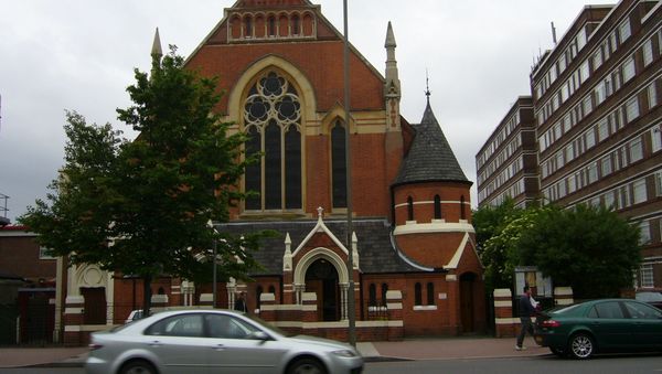 The Polish Roman Catholic Church of Christ the King in Balham High Road, Balham, London. Part of Du Cane Court can be seen on the right. - Sputnik International