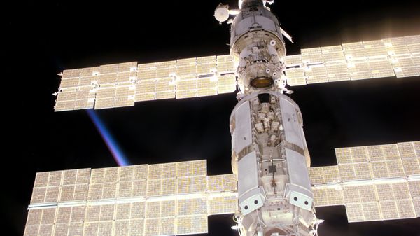 This photo provided by NASA shows the International Space Station as seen from Space Shuttle Atlantis during mission STS-106, which delivered supplies and performed maintenance in September 2000. - Sputnik International
