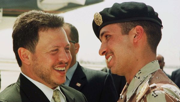 Jordan's King Abdullah II laughs with his brother Crown Prince Hamzeh, right, on Monday, April 2, 2001, shortly before the Jordanian monarch embarked on a tour of the United States - Sputnik International