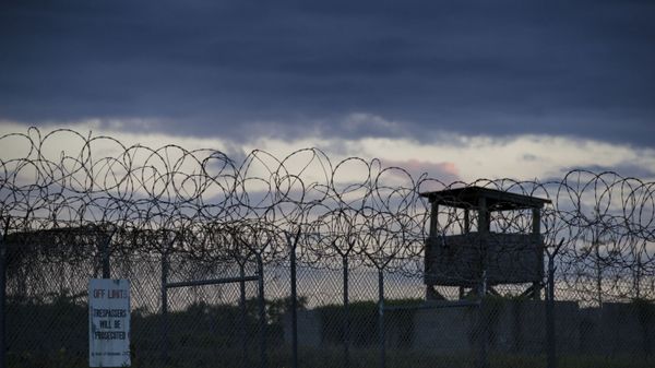 In this photo reviewed by U.S. military officials, the sun sets behind the closed Camp X-Ray detention facility, Wednesday, April 17, 2019, in Guantanamo Bay Naval Base, Cuba. In this photo reviewed by U.S. military officials, the sun sets behind the closed Camp X-Ray detention facility, Wednesday, April 17, 2019, in Guantanamo Bay Naval Base, Cuba. - Sputnik International