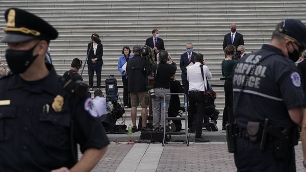 US Capitol Police stand between protesters and Senate Minority Leader Chuck Schumer, D-N.Y., and Democratic members of the Senate Judiciary Committee during a news conference, file photo. - Sputnik International