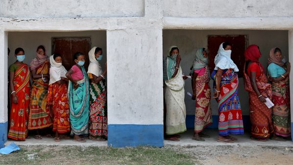 Women wait in line to cast their vote at a polling booth during the first phase of West Bengal state election in the Purulia district, India. Women wait in line to cast their vote at a polling booth during the first phase of West Bengal state election in the Purulia district, India. - Sputnik International