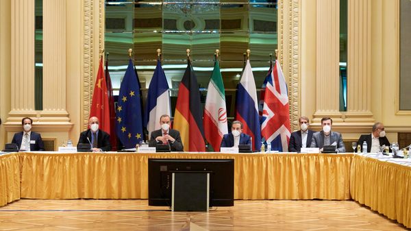 In this Handout photo made available by the EU delegation in Vienna shows  Diplomats of the EU, China, Russia and Iran at the start of talks at the Grand Hotel in Vienna on April 6, 2021. - The US will participate in discussions in Vienna to try to save the international agreement on Iranian nuclear power. However, they will not be at the same table as Tehran and it is the Europeans who will serve as intermediaries between the two parties, in the hope of achieving concrete results after two months of impasse.  - Sputnik International