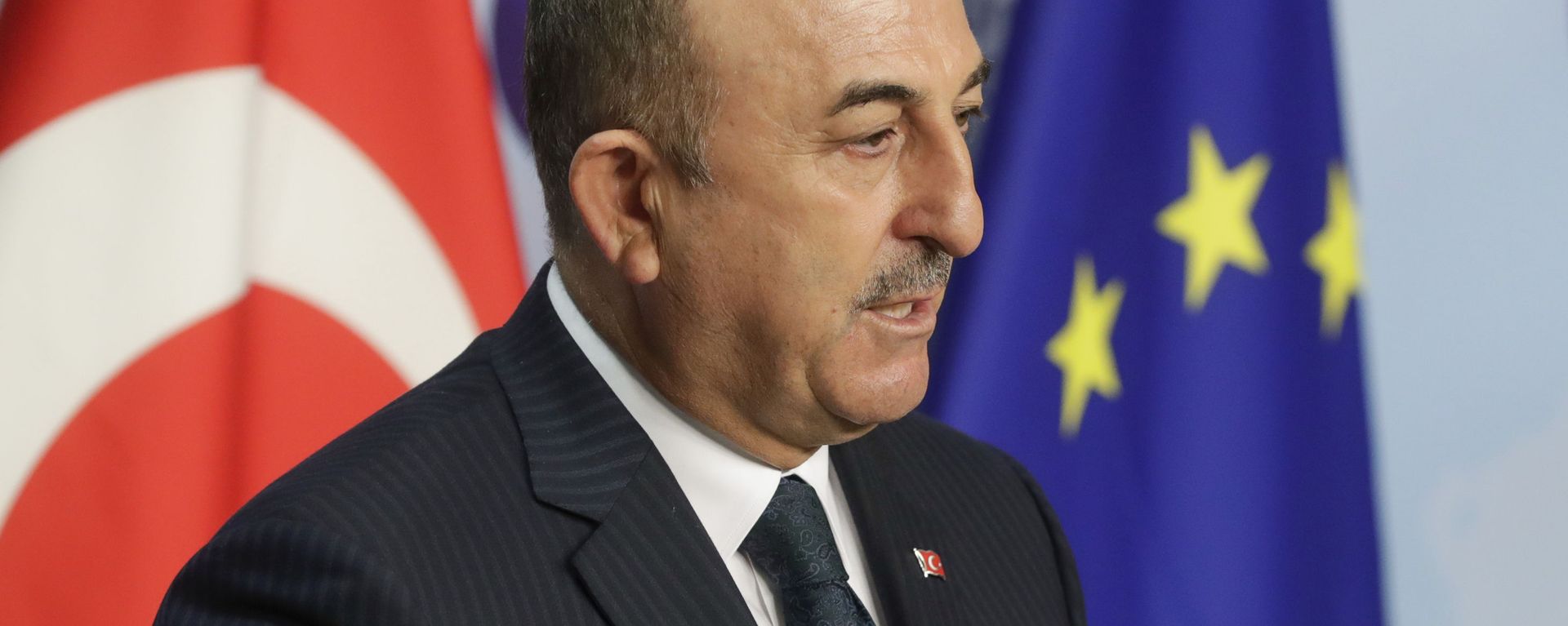 Turkey's Foreign Minister Mevlut Cavusoglu gives a joint statement with European Union foreign policy chief Josep Borrell prior to their meeting in Brussels, Thursday, Jan. 21, 2021. - Sputnik International, 1920, 21.05.2023