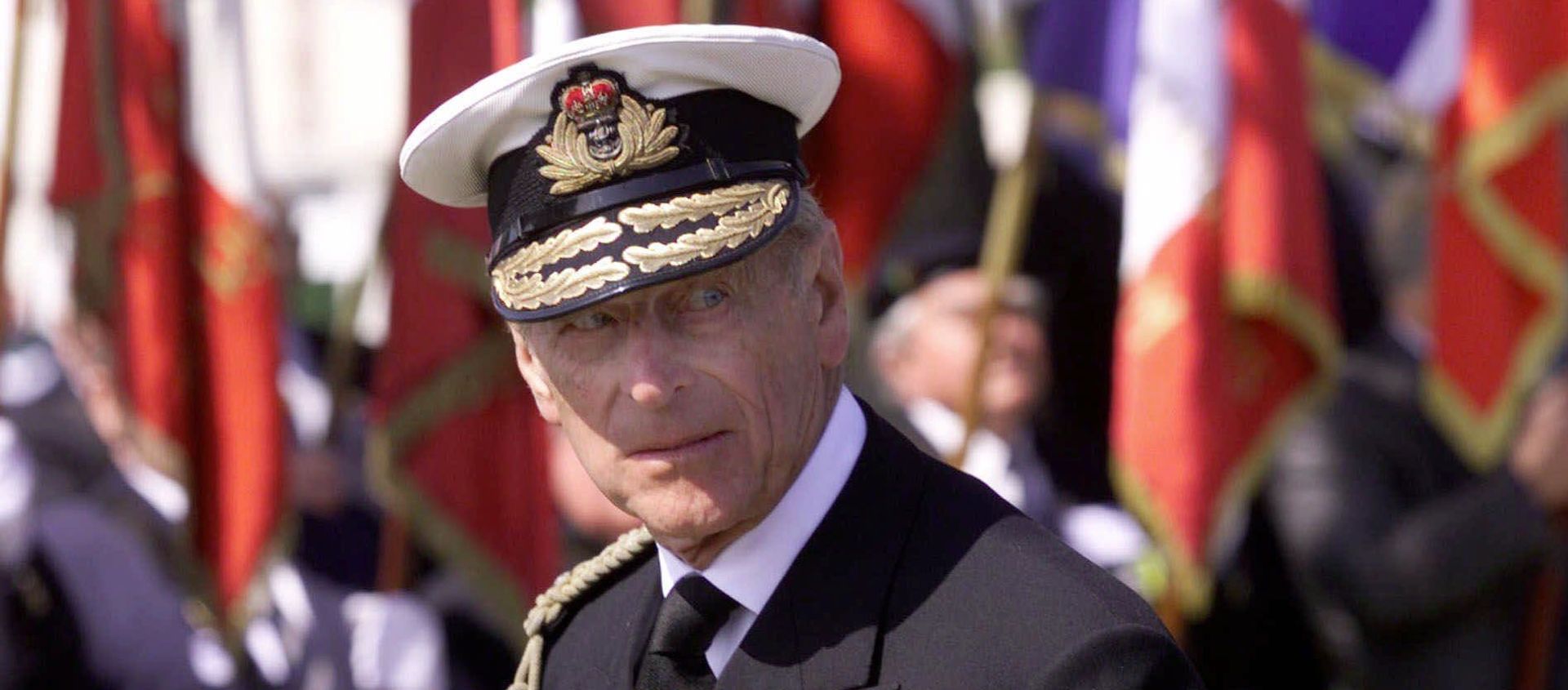 Britain's Prince Philip  appears in front of flags during a ceremony commemorating the D-Day landing in Ouistreham, Normandy, France, Tuesday June 6, 2000 - Sputnik International, 1920, 09.04.2021