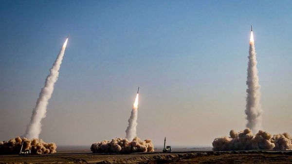 This handout photo provided by Iran's Revolutionary Guard Corps (IRGC) official website via SEPAH News on January 15, 2021, shows a launch of missiles during a military drill in an unknown location in central Iran - Sputnik International