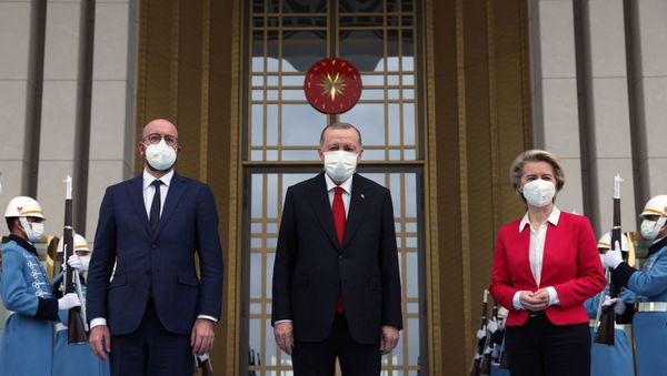 This handout picture taken and released on April 6, 2021 by Turkish Presidential Press Service shows Turkish President Recep Tayyip Erdogan receiving EU Council President Charles Michel (L) and President of EU Commission Ursula Von der Leyen (R) at the Presidential Complex in Ankara. (Photo by HANDOUT / TURKISH PRESIDENCY PRESS OFFICE / AFP) / RESTRICTED TO EDITORIAL USE  - Sputnik International