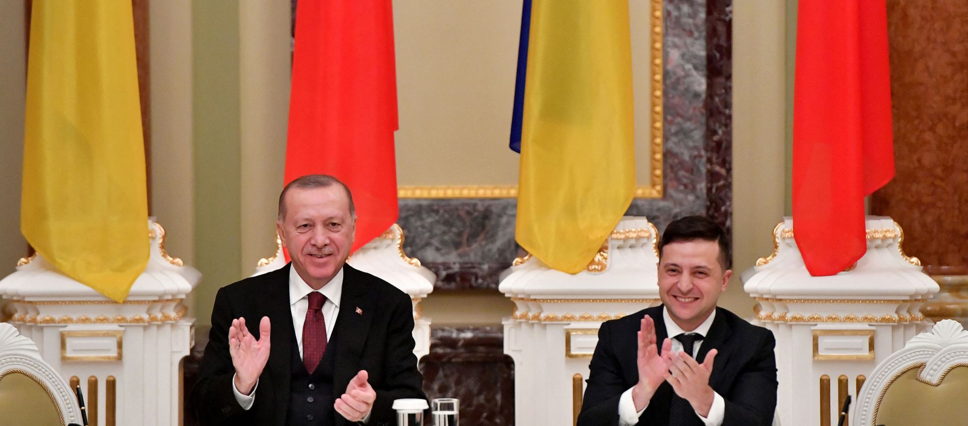 Ukrainian President Volodymyr Zelensky and his Turkish counterpart Recep Tayyip Erdogan react during a joint press conference following their meeting in Kiev on February 3, 2020. (Photo by Sergei SUPINSKY / AFP) Ukrainian President Volodymyr Zelensky and his Turkish counterpart Recep Tayyip Erdogan react during a joint press conference following their meeting in Kiev on February 3, 2020. (Photo by Sergei SUPINSKY / AFP) - Sputnik International, 1920, 10.04.2021