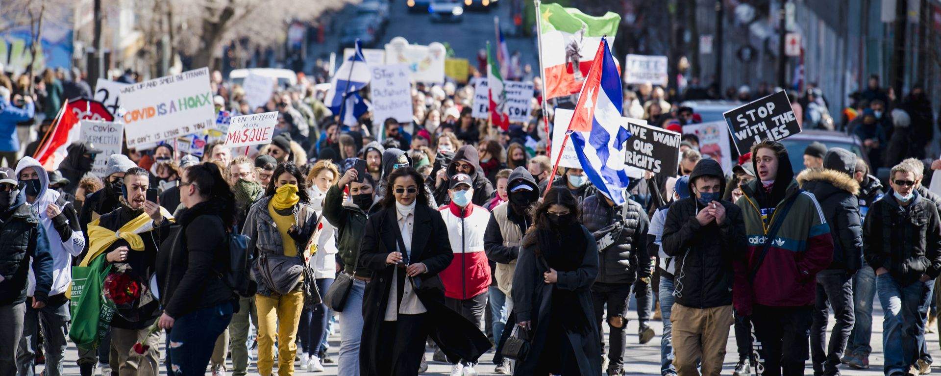 Thousands of people march in protest against Quebec’s Covid-19 lockdown measures in Montreal, Canada on March 20, 2021 Thousands of people march in protest against Quebec’s Covid-19 lockdown measures in Montreal, Canada on March 20, 2021 - Sputnik International, 1920, 26.05.2021