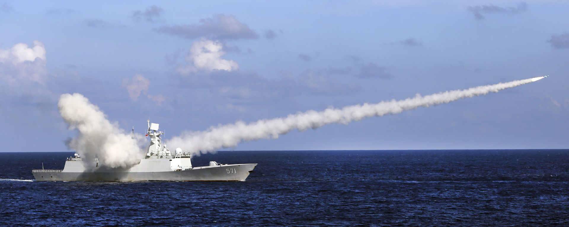 In this Friday, July 8, 2016, file photo released by Xinhua News Agency, Chinese missile frigate Yuncheng launches an anti-ship missile during a military exercise in the waters near south China's Hainan Island and Paracel Islands. China is holding another round of military drills in the South China Sea amid an uptick in such activity in the area highlighting growing tensions - Sputnik International, 1920, 29.08.2023