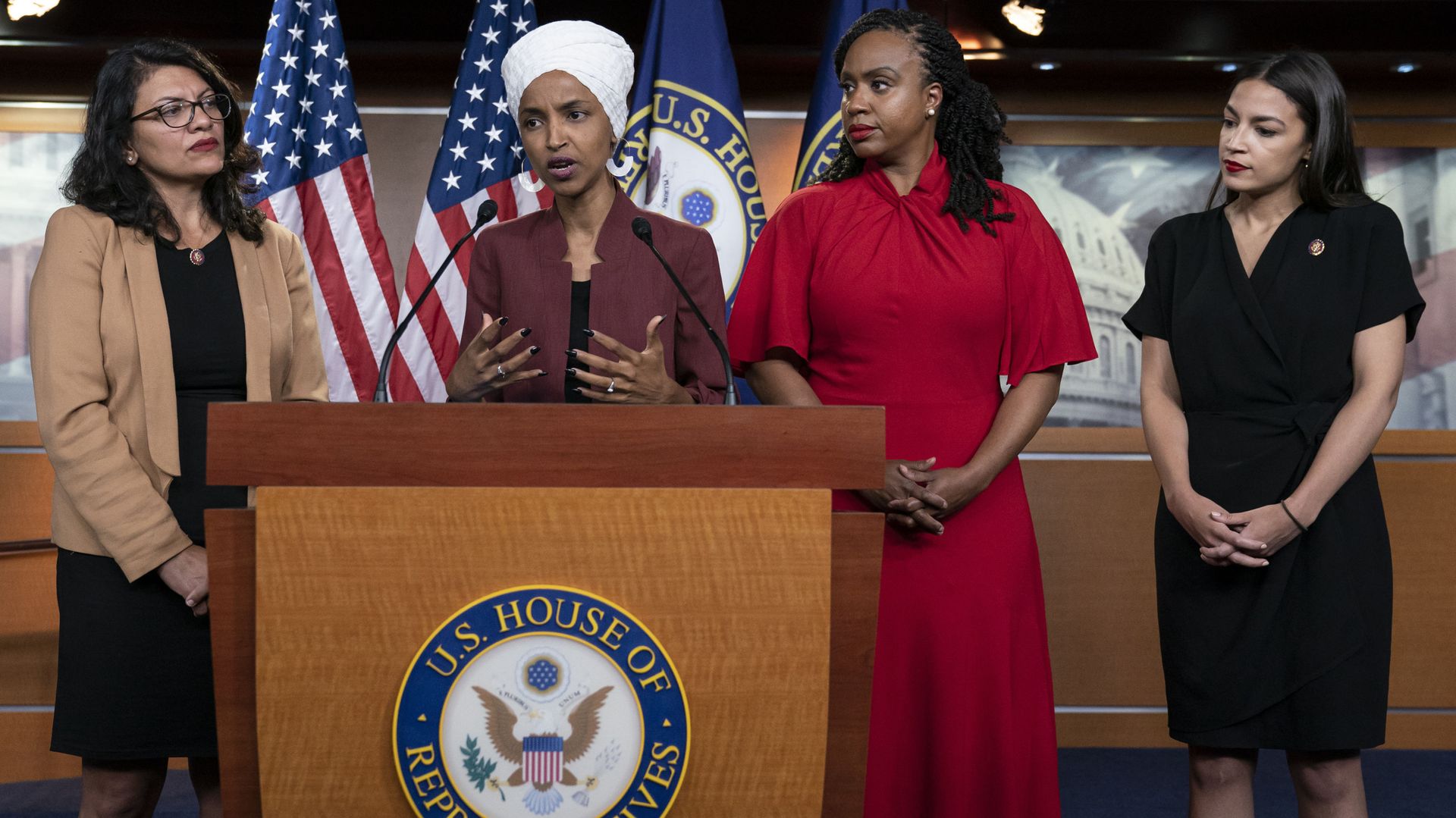 From left, U.S. Reps. Rashida Tlaib, D-Mich., Ilhan Omar, D-Minn., Ayanna Pressley, D-Mass., and Alexandria Ocasio-Cortez, D-N.Y., respond to base remarks by President Donald Trump after he called for four Democratic congresswomen of color to go back to their broken countries, as he exploited the nation's glaring racial divisions once again for political gain, during a news conference at the Capitol in Washington, Monday, July 15, 2019 From left, U.S. Reps. Rashida Tlaib, D-Mich., Ilhan Omar, D-Minn., Ayanna Pressley, D-Mass., and Alexandria Ocasio-Cortez, D-N.Y., respond to base remarks by President Donald Trump after he called for four Democratic congresswomen of color to go back to their broken countries, as he exploited the nation's glaring racial divisions once again for political gain, during a news conference at the Capitol in Washington, Monday, July 15, 2019 - Sputnik International, 1920, 24.05.2021