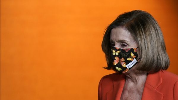House Speaker Nancy Pelosi of Calif., walks to a lectern to answer a reporter's question during a news conference before participating in the House Democratic Issues Conference on Capitol Hill in Washington, Tuesday, March 2, 2021 - Sputnik International
