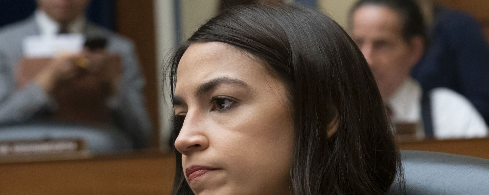 Rep. Alexandria Ocasio-Cortez, D-N.Y., attends a House Oversight Committee hearing on high prescription drugs prices shortly after her private meeting with Speaker of the House Nancy Pelosi, D-Calif., on Capitol Hill in Washington, Friday, July 26, 2019 Rep. Alexandria Ocasio-Cortez, D-N.Y., attends a House Oversight Committee hearing on high prescription drugs prices shortly after her private meeting with Speaker of the House Nancy Pelosi, D-Calif., on Capitol Hill in Washington, Friday, July 26, 2019 - Sputnik International, 1920, 11.01.2023