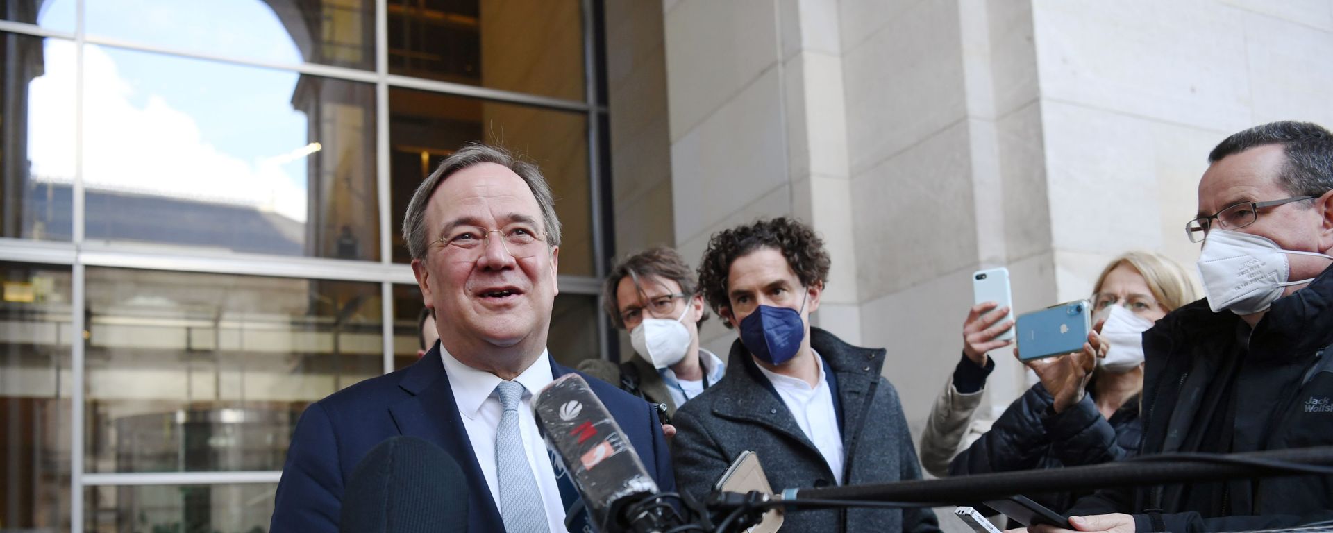 North Rhine-Westphalia's State Premier and head of Germany's conservative Christian Democratic Union (CDU) party Armin Laschet speaks to the media as he leaves after a CDU/CSU fraction meeting in Berlin, Germany April 13, 2021 - Sputnik International, 1920, 14.04.2021