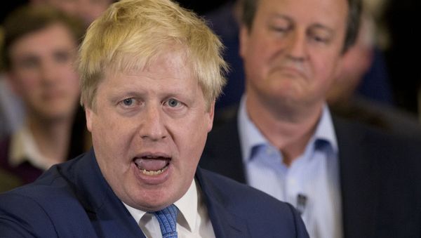 In this Tuesday, May 3, 2016 file photo Britain's Prime Minister David Cameron, right, listens as then Mayor of London Boris Johnson speaks at a mayoral election campaign rally for Britain's Conservative party candidate for Mayor of London Zac Goldsmith at a school in Ham, a suburb in south west London - Sputnik International