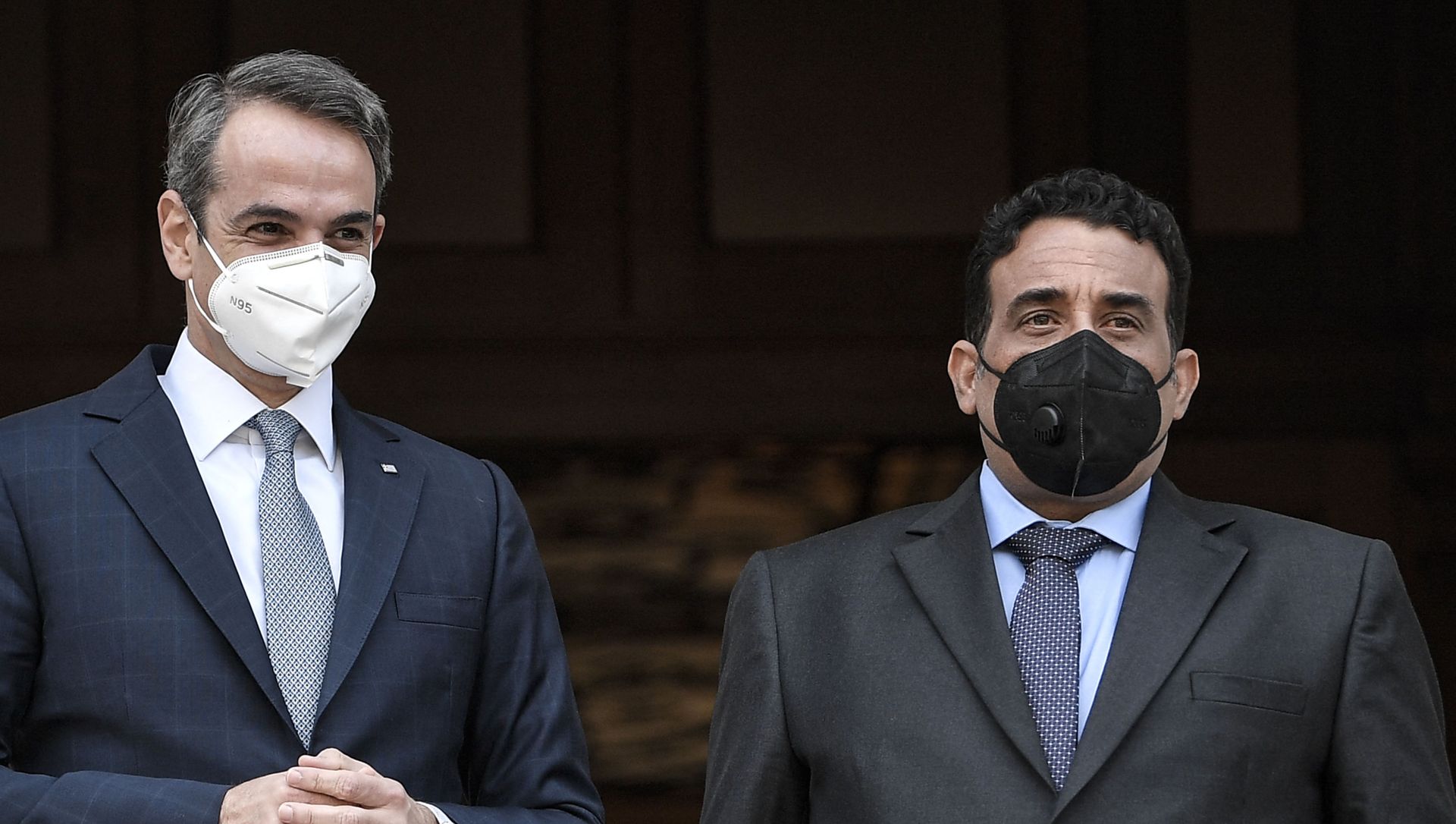 Greek Prime minister Kyriakos Mitsotakis (L) poses Libya's presidential council chairman Mohammad Younes Menfi (R) prior to their meeting in Athens on April 14, 2021. Greek Prime minister Kyriakos Mitsotakis (L) poses Libya's presidential council chairman Mohammad Younes Menfi (R) prior to their meeting in Athens on April 14, 2021. - Sputnik International, 1920, 14.04.2021