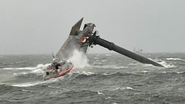A Coast Guard Station Grand Isle 45-foot Respone Boat-Medium boatcrew heads toward a capsized 175-foot commerical lift boat April 13, 2021 searching for people in the water 8 miles south of Grand Isle, Louisiana. The Coast Guard and multiple good Samaritan vessels responded to the capsized vessel and searched for multiple missing people in the water. - Sputnik International