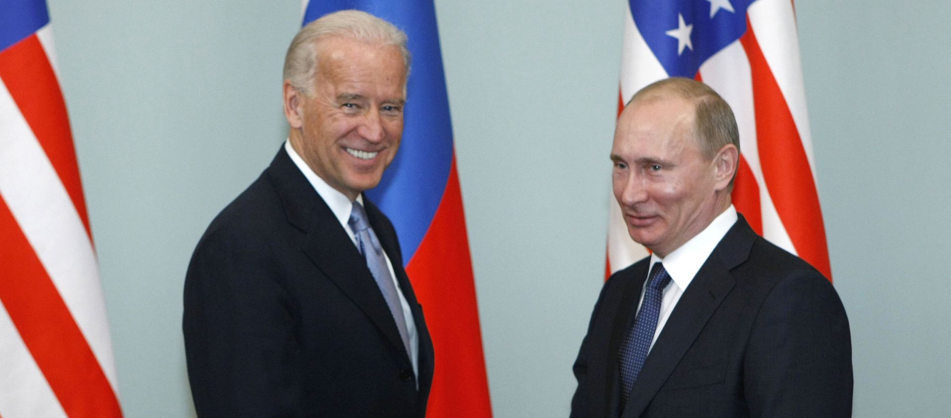 In this March 10, 2011, file photo, Vice President of the United States Joe Biden, left, shakes hands with Russian Prime Minister Vladimir Putin in Moscow, Russia. In this March 10, 2011, file photo, Vice President of the United States Joe Biden, left, shakes hands with Russian Prime Minister Vladimir Putin in Moscow, Russia. - Sputnik International, 1920, 25.05.2021