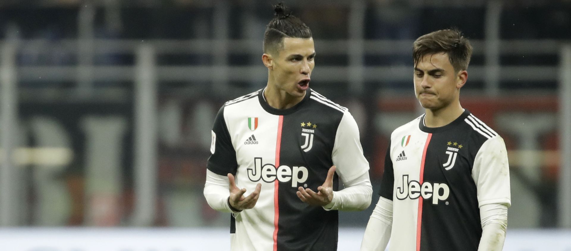 Juventus' Cristiano Ronaldo, left, speaks with Juventus' Paulo Dybala at the end of the Italian Cup soccer match between AC Milan and Juventus at the San Siro stadium, in Milan, Italy, Thursday, 13 February 2020 Juventus' Cristiano Ronaldo, left, speaks with Juventus' Paulo Dybala at the end of the Italian Cup soccer match between AC Milan and Juventus at the San Siro stadium, in Milan, Italy, Thursday, 13 February 2020 - Sputnik International, 1920, 15.04.2021