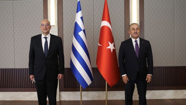 Turkish Foreign Minister Mevlut Cavusoglu meets with his Greek counterpart Nikos Dendias in Ankara, Turkey April 15, 2021. - Sputnik International