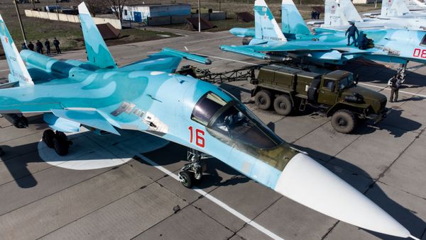 A Su-34 fighter-bomber before the start of the regional qualifying stage of the Aviadarts-2021 international flight crew training competition on the territory of an aviation regiment of the Southern Military District (YuVO) in the Krasnodar Territory. - Sputnik International
