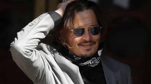 In this file photo dated Tuesday, July 28, 2020, US Actor Johnny Depp arrives at the High Court in London during his case against News Group Newspapers over a story published about his former wife Amber Heard, which branded him a 'wife beater' - Sputnik International