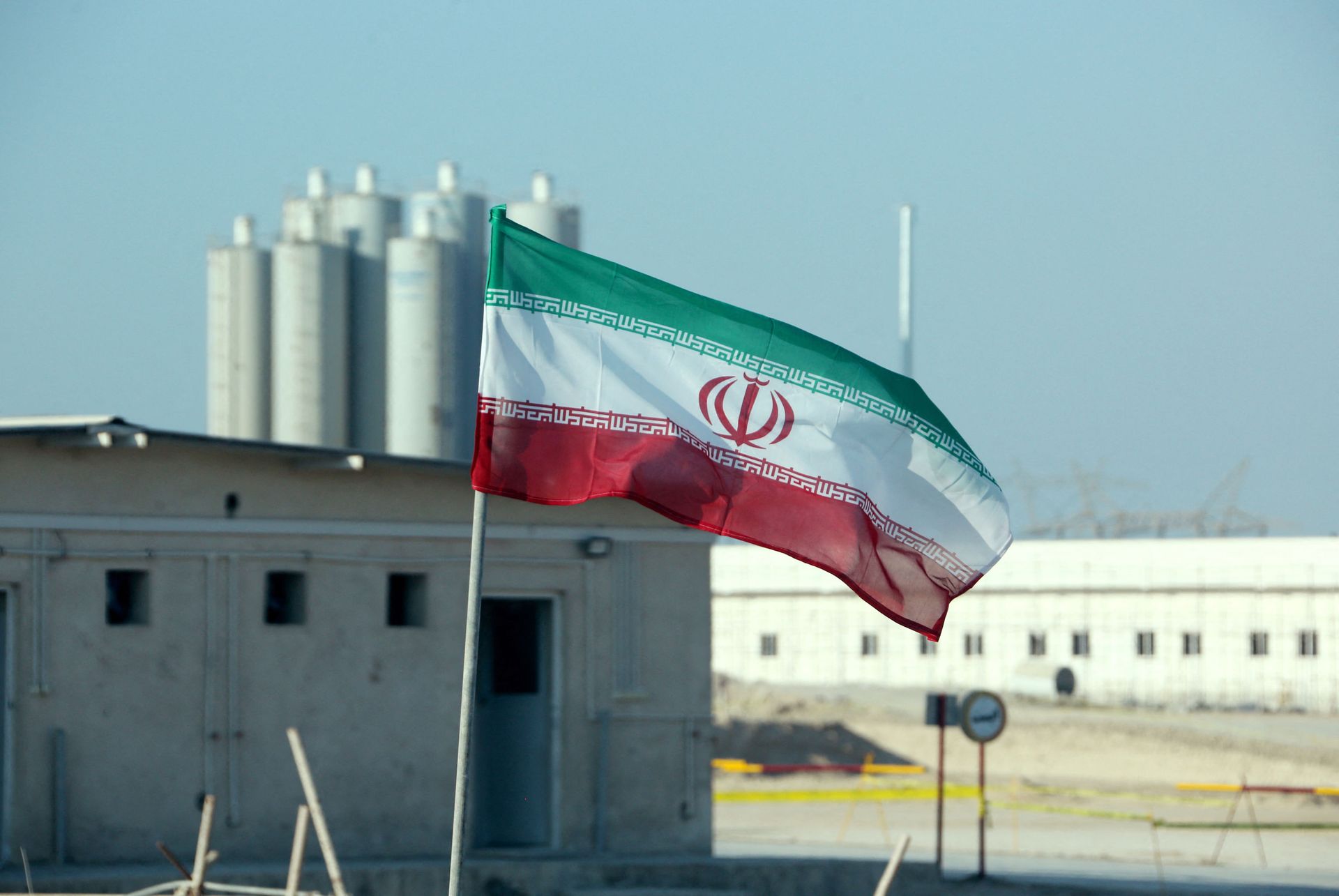 A picture taken on November 10, 2019, shows an Iranian flag in Iran's Bushehr nuclear power plant, during an official ceremony to kick-start works on a second reactor at the facility A picture taken on November 10, 2019, shows an Iranian flag in Iran's Bushehr nuclear power plant, during an official ceremony to kick-start works on a second reactor at the facility - Sputnik International, 1920, 07.09.2021