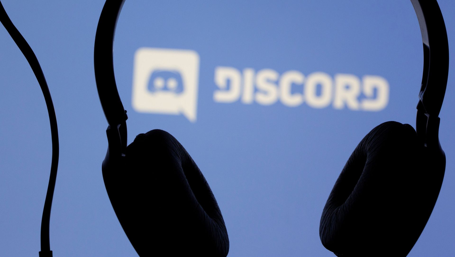 Headphones are seen in front of displayed Discord app logo in this illustration taken March 29, 2021. Headphones are seen in front of displayed Discord app logo in this illustration taken March 29, 2021. - Sputnik International, 1920, 21.04.2021
