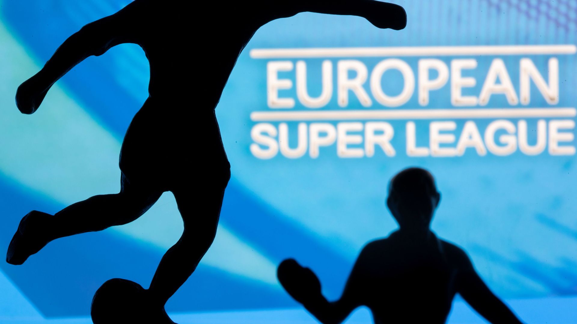 Metal figures of football players are seen in front of the words European Super League in this illustration taken April 20, 2021 Metal figures of football players are seen in front of the words European Super League in this illustration taken April 20, 2021 - Sputnik International, 1920, 21.04.2021