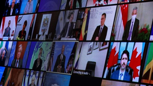 World leaders appear on screen during a virtual Climate Summit, seen from the East Room at the White House in Washington, U.S., April 22, 2021. - Sputnik International