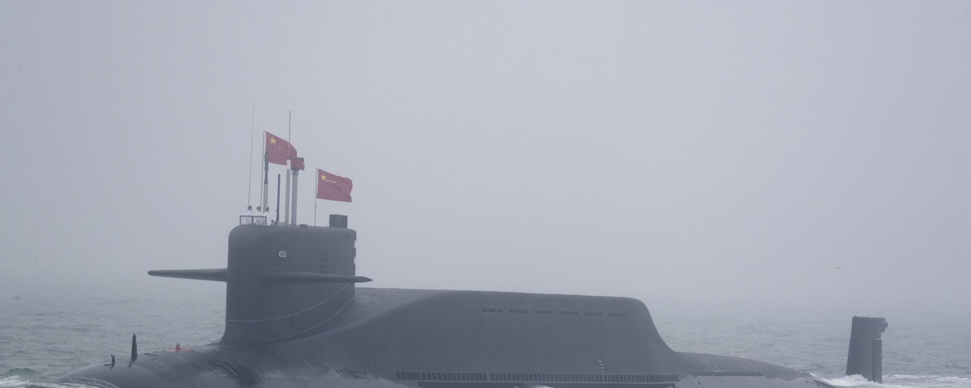 A new type 094A Jin-class nuclear submarine Long March 10 of the Chinese People's Liberation Army (PLA) Navy participates in a naval parade to commemorate the 70th anniversary of the founding of China's PLA Navy in the sea near Qingdao in eastern China's Shandong province, Tuesday, April 23, 2019 A new type 094A Jin-class nuclear submarine Long March 10 of the Chinese People's Liberation Army (PLA) Navy participates in a naval parade to commemorate the 70th anniversary of the founding of China's PLA Navy in the sea near Qingdao in eastern China's Shandong province, Tuesday, April 23, 2019 - Sputnik International, 1920, 20.08.2024