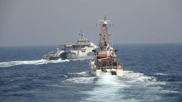 ARABIAN GULF (April 2, 2021) Iran’s Islamic Revolutionary Guard Corps Navy (IRGCN) Harth 55, left, conducted an unsafe and unprofessional action by crossing the bow of the Coast Guard patrol boat USCGC Monomoy (WPB 1326), right, as the U.S. vessel was conducting a routine maritime security patrol in international waters of the southern Arabian Gulf, Apr. 2. The USCGC ships are assigned to Patrol Forces Southwest Asia (PATFORSWA), the largest U.S. Coast Guard unit outside the United States, and operate under U.S. Naval Forces Central Command’s Task Force 55. - Sputnik International
